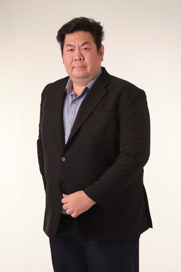 Stock portrait for layout only; not the quoted investor